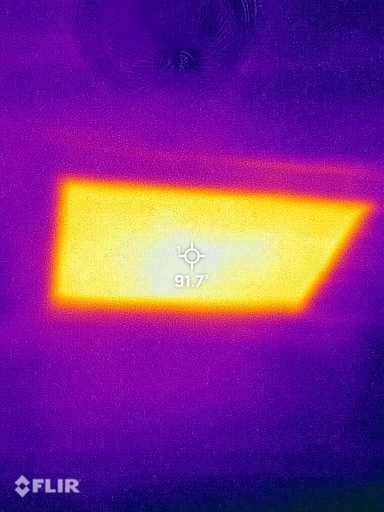Thermal image of attic access hatch measuring 90°F, a 10-20° difference from ambient temperature